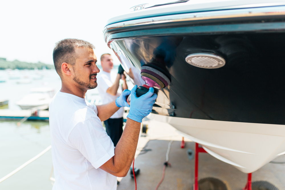 Boat,Maintenance,-,Man,With,Orbital,Polisher,Polishing,Boat,In